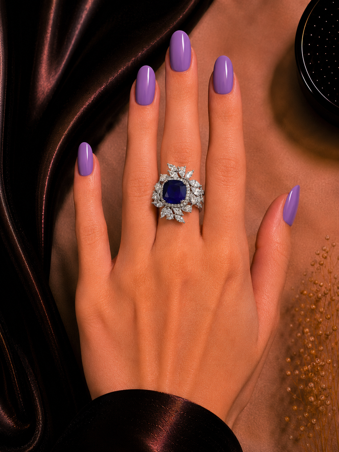BLUE CENTRE STONE WITH HALO DESIGN RING
