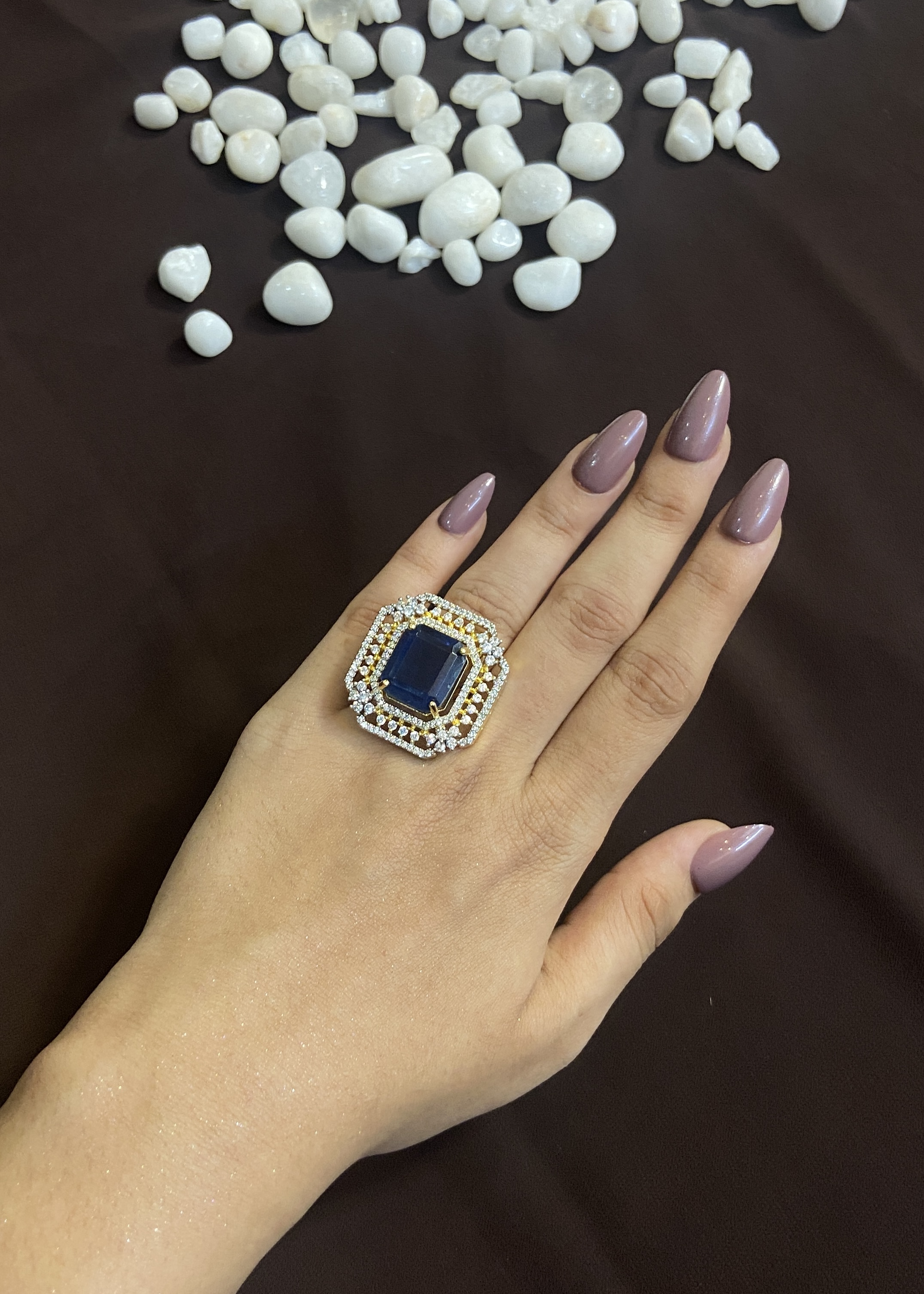 SAPPHIRE CENTRE STONE WITH ELEGANT DIAMOND BORDERS RING