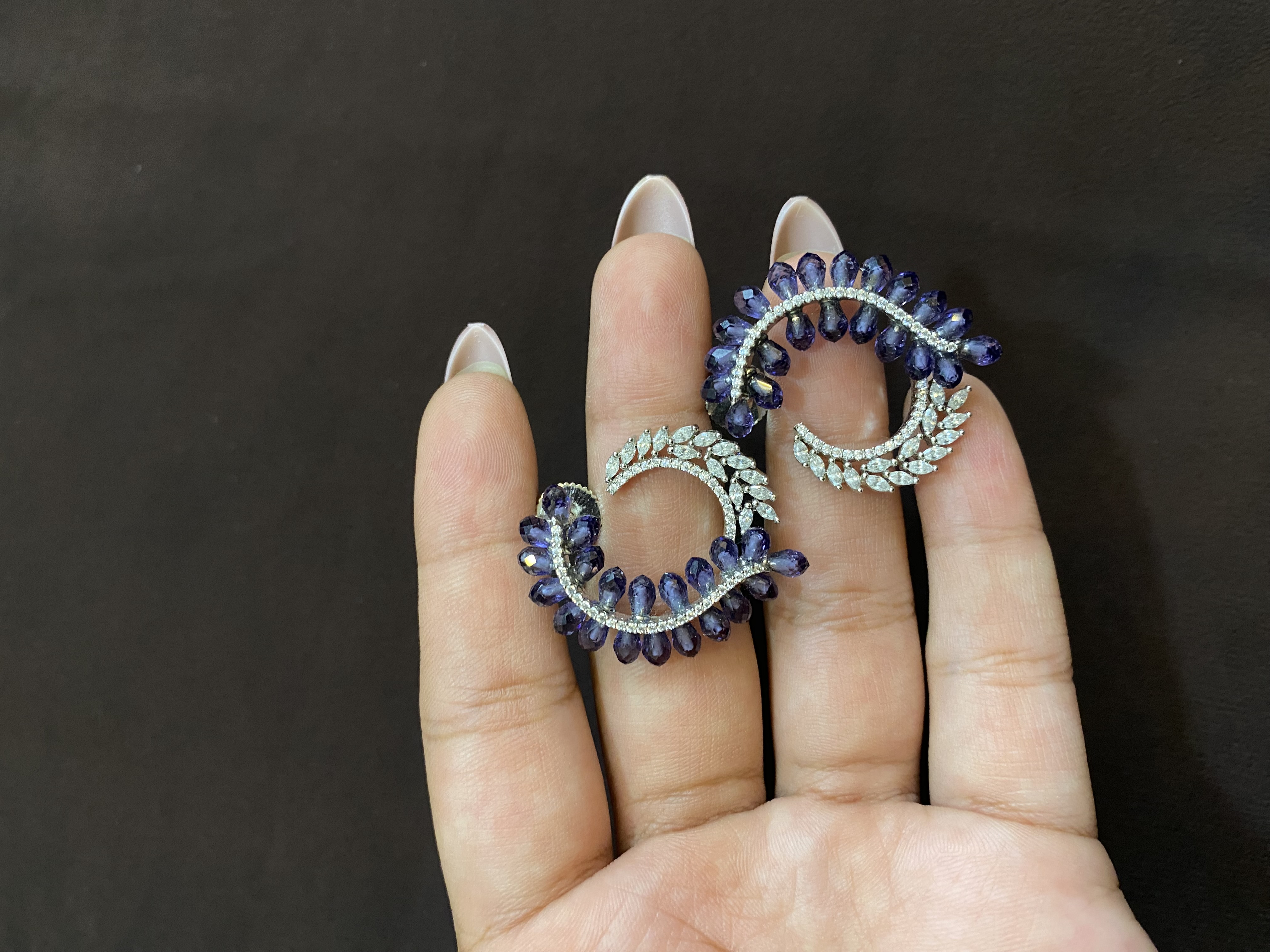 ELEGANTLY SHAPED PURPLE CRYSTAL & WHITE DIAMOND TOPS